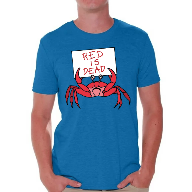 A man wearing a blue t-shirt with a sad red crab holding a sign that says 'RED IS DEAD'